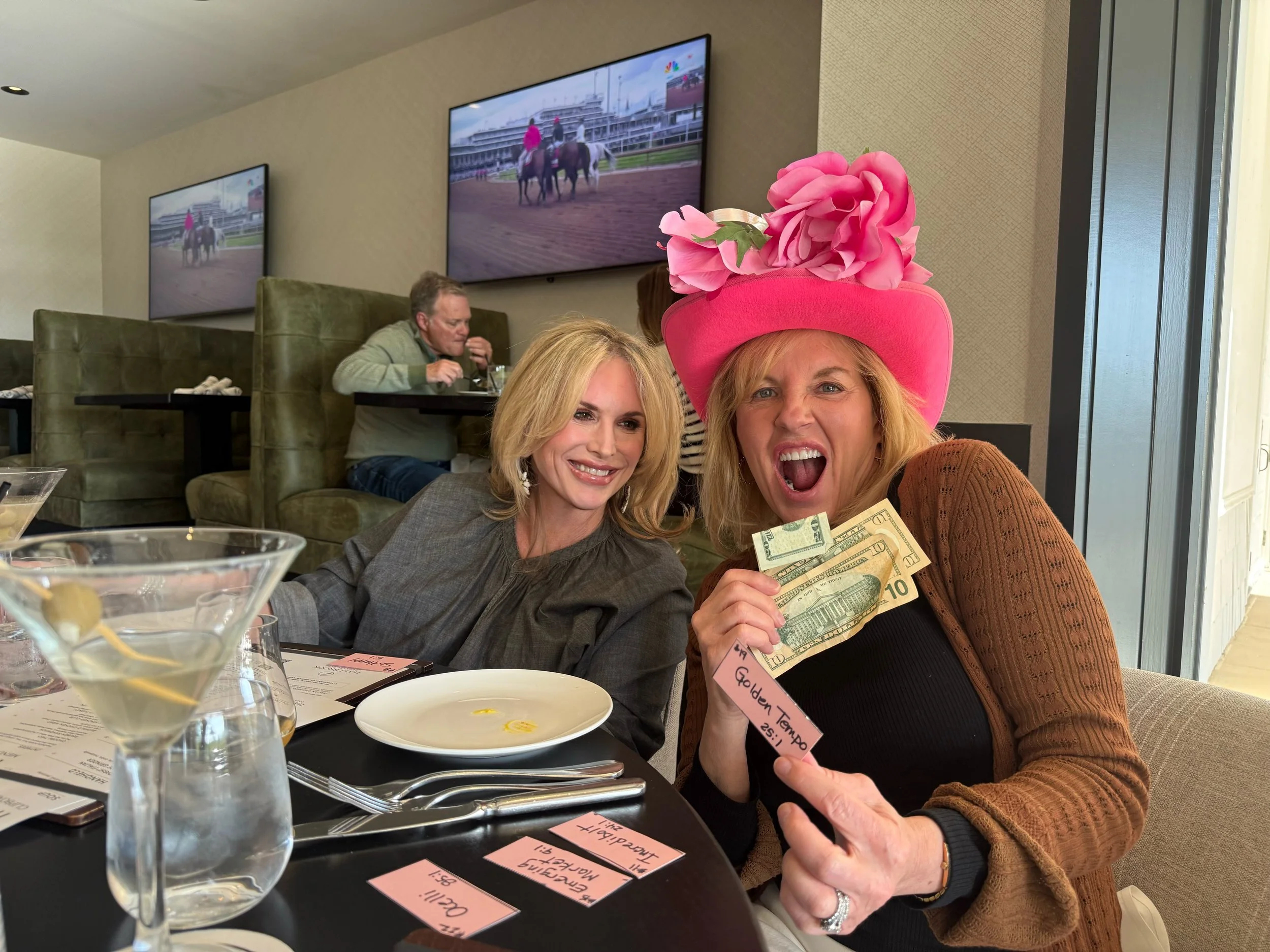 Vicki Ferguson celebrating Derby Day with a friend at a Kansas City Country Club.