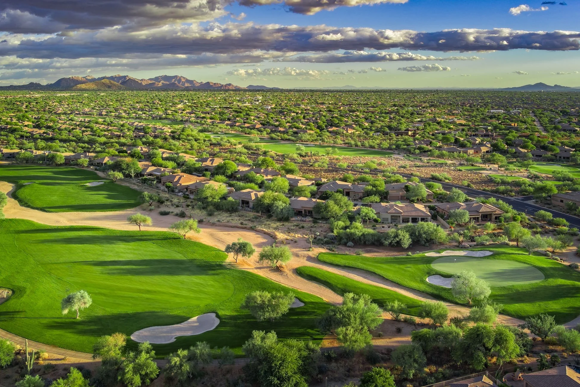 Aerial view of Terravita Golf & Country Club and the surrounding North Scottsdale community with the golf course and desert mountains.