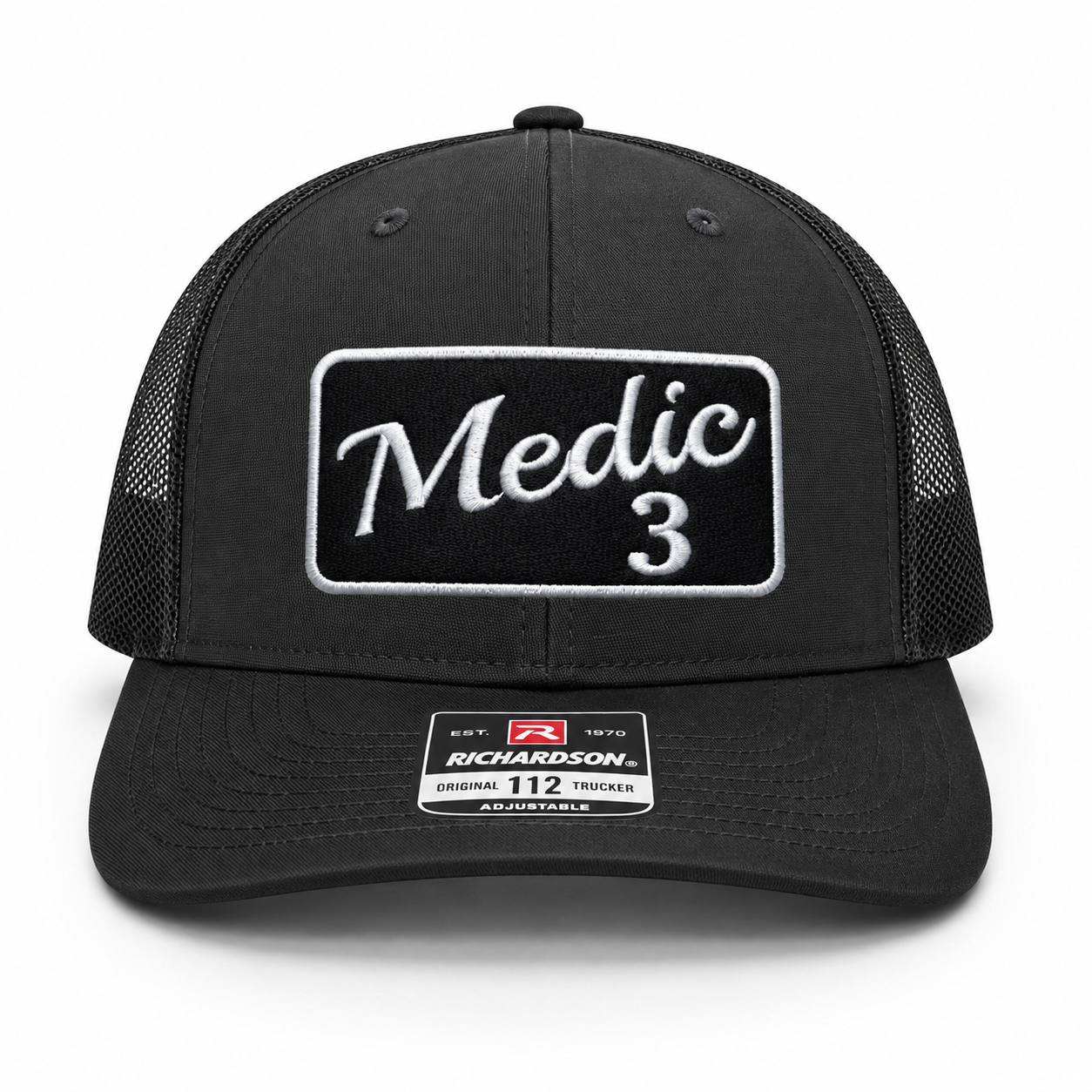 Black Richardson 112 trucker hat with custom embroidered Medic EMS patch.