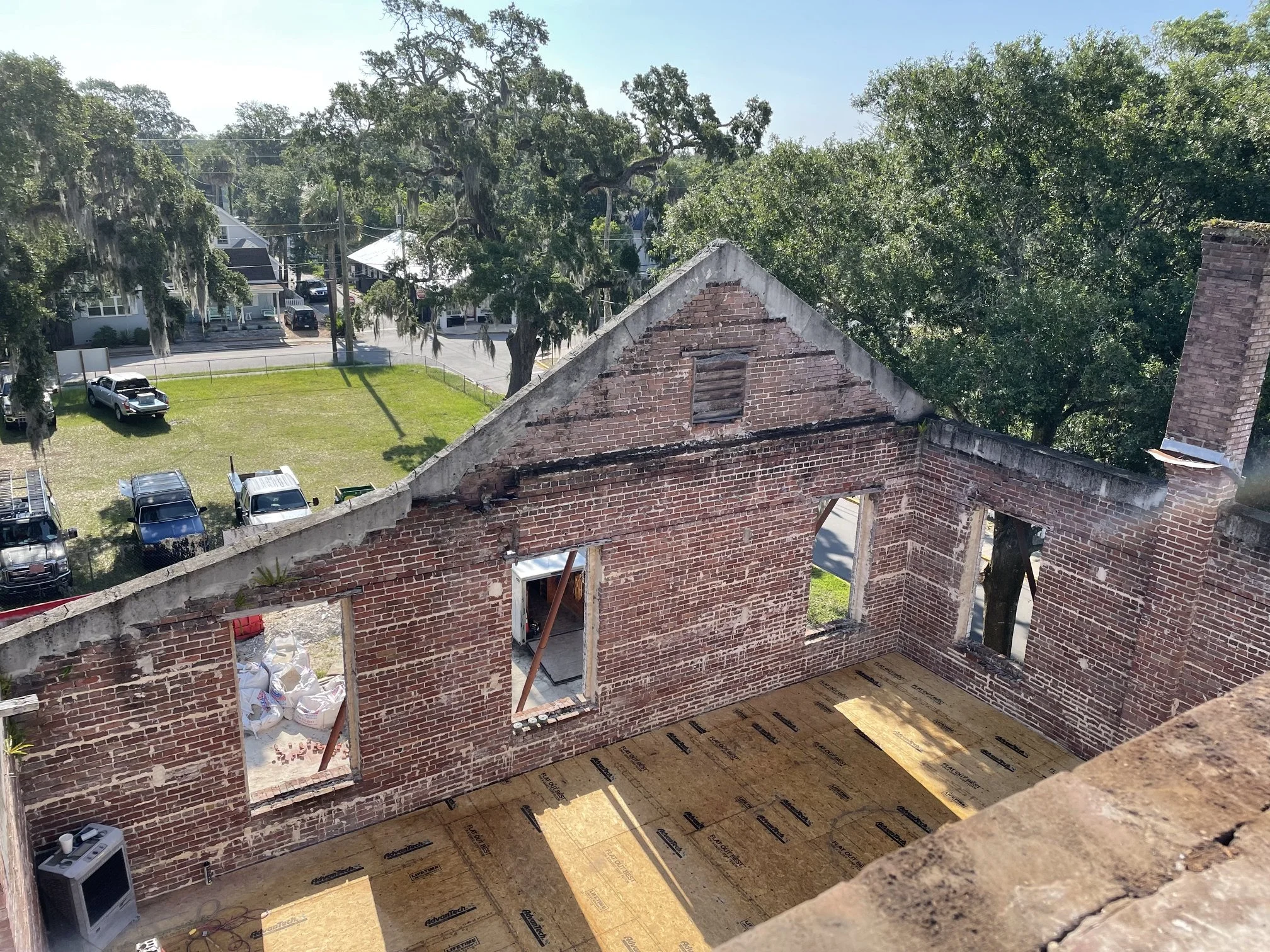 we had to keep the framing 1'' off the wall the brick ended up being stucco and we went in a seal it with water proofing