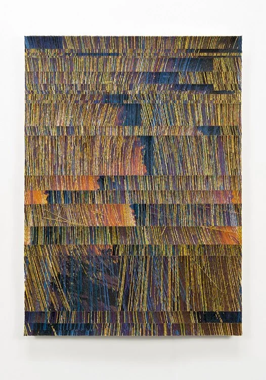 A sculptural piece assembled from layers of blue, purple, yellow, and orange wires.