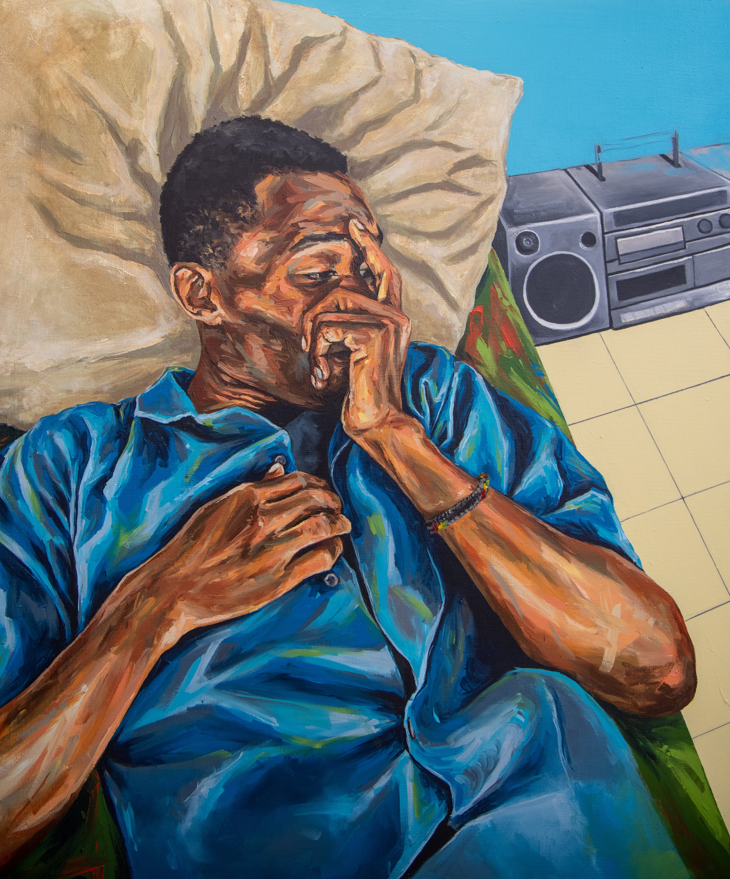 Painting of an elderly man with dark hair, wearing a striped blue shirt, lying on a bed with his hand covering his face. A radio is placed on the nightstand beside him.