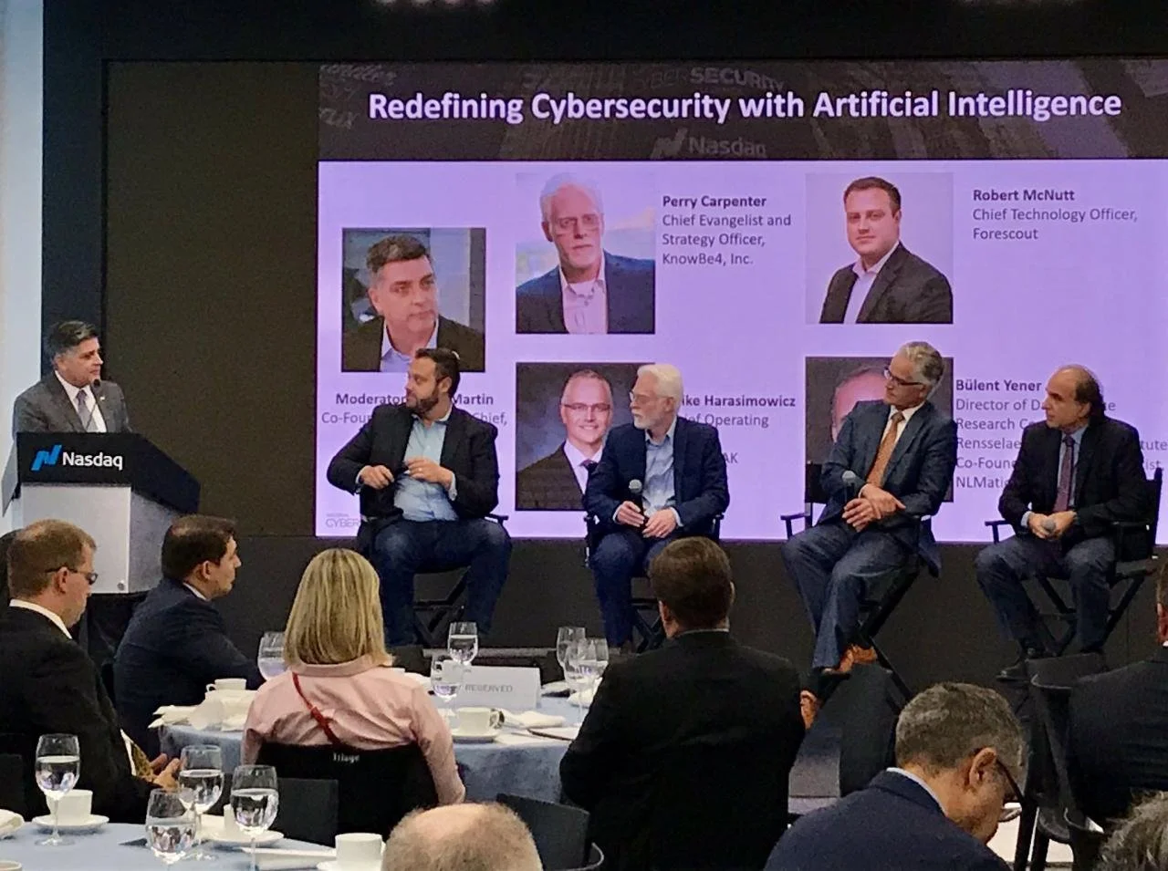 Perry Carpenter participating in a panel discussion at Nasdaq. The session was titled 'Redefining Cybersecurity with Artificial Intelligence'.