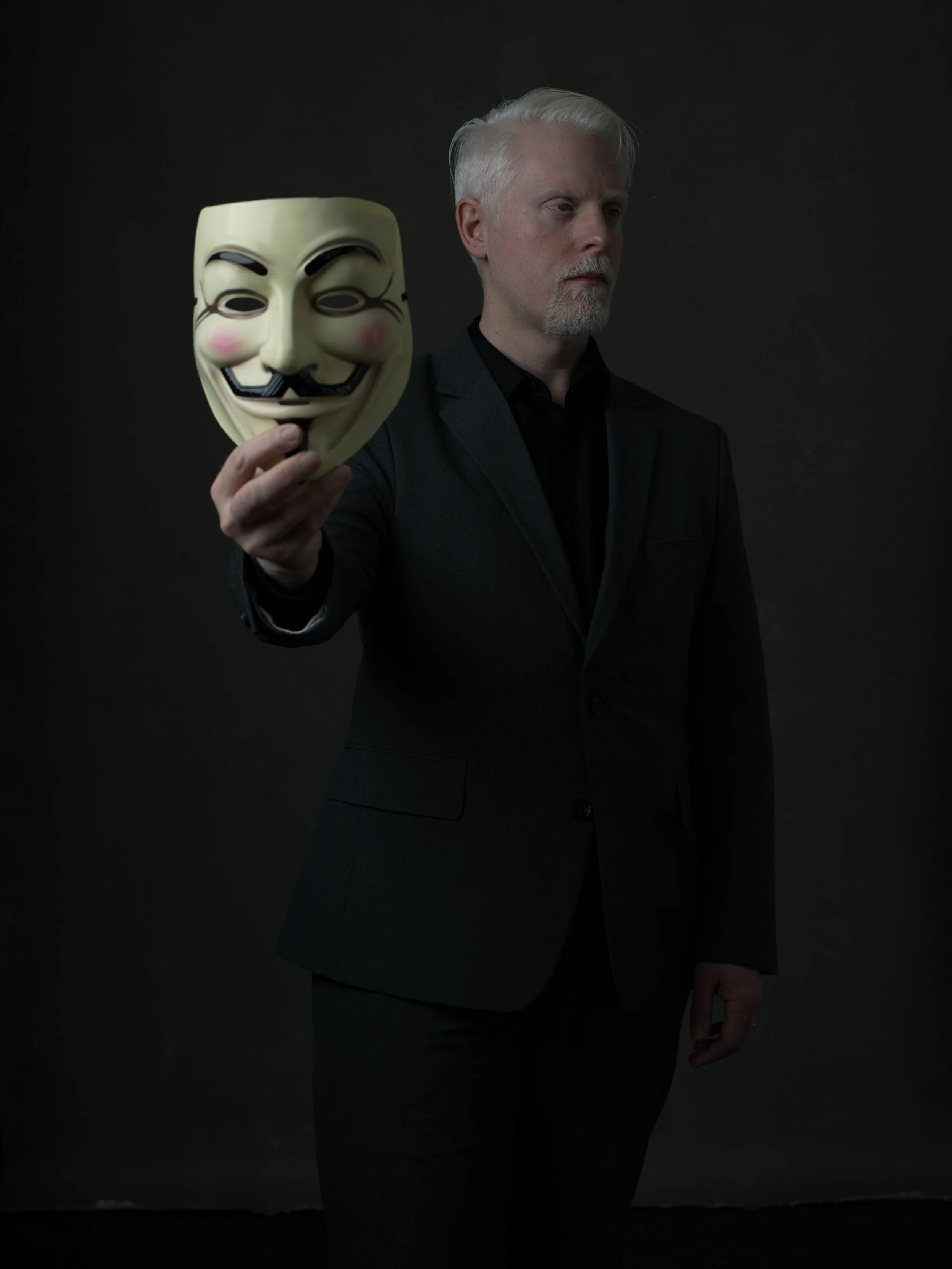Perry Carpenter posing with a Guy Fawkes mask
