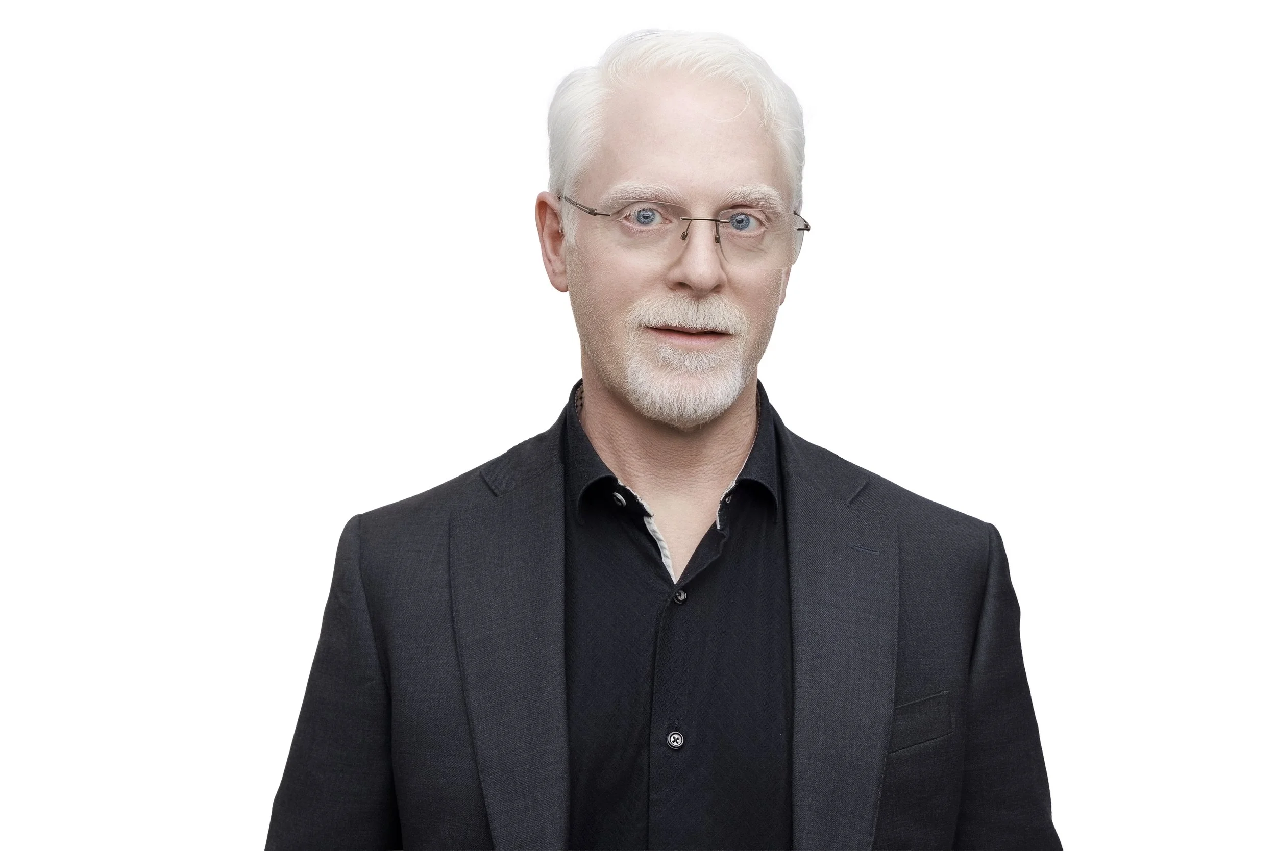 Perry Carpenter 2026 headshot against a white background.