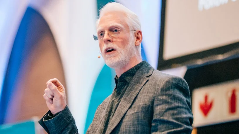 Perry Carpenter presenting at a conference.