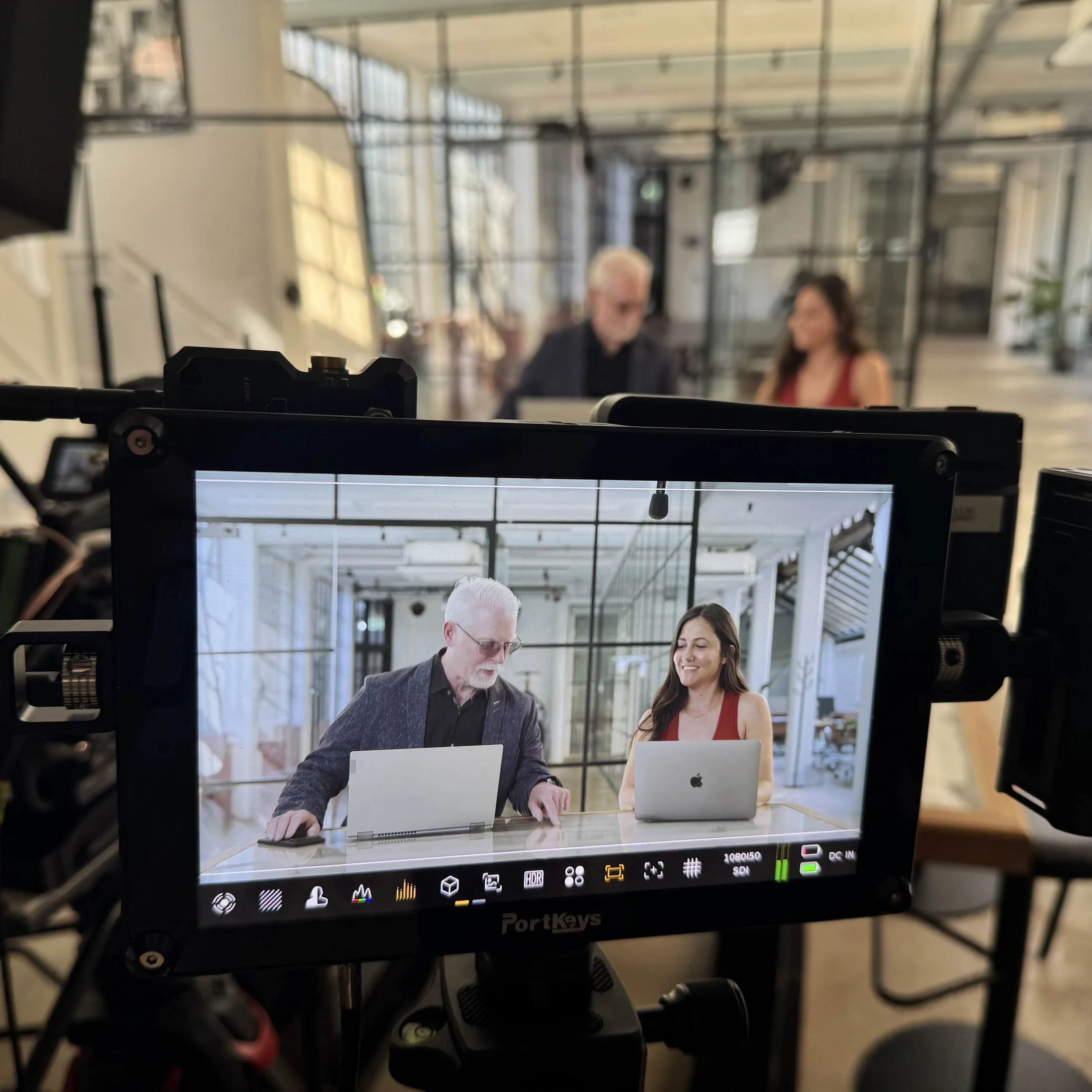 Behind the Scenes shot of a KnowBe4 production. Perry Carpenter and Isida Drake pictured.