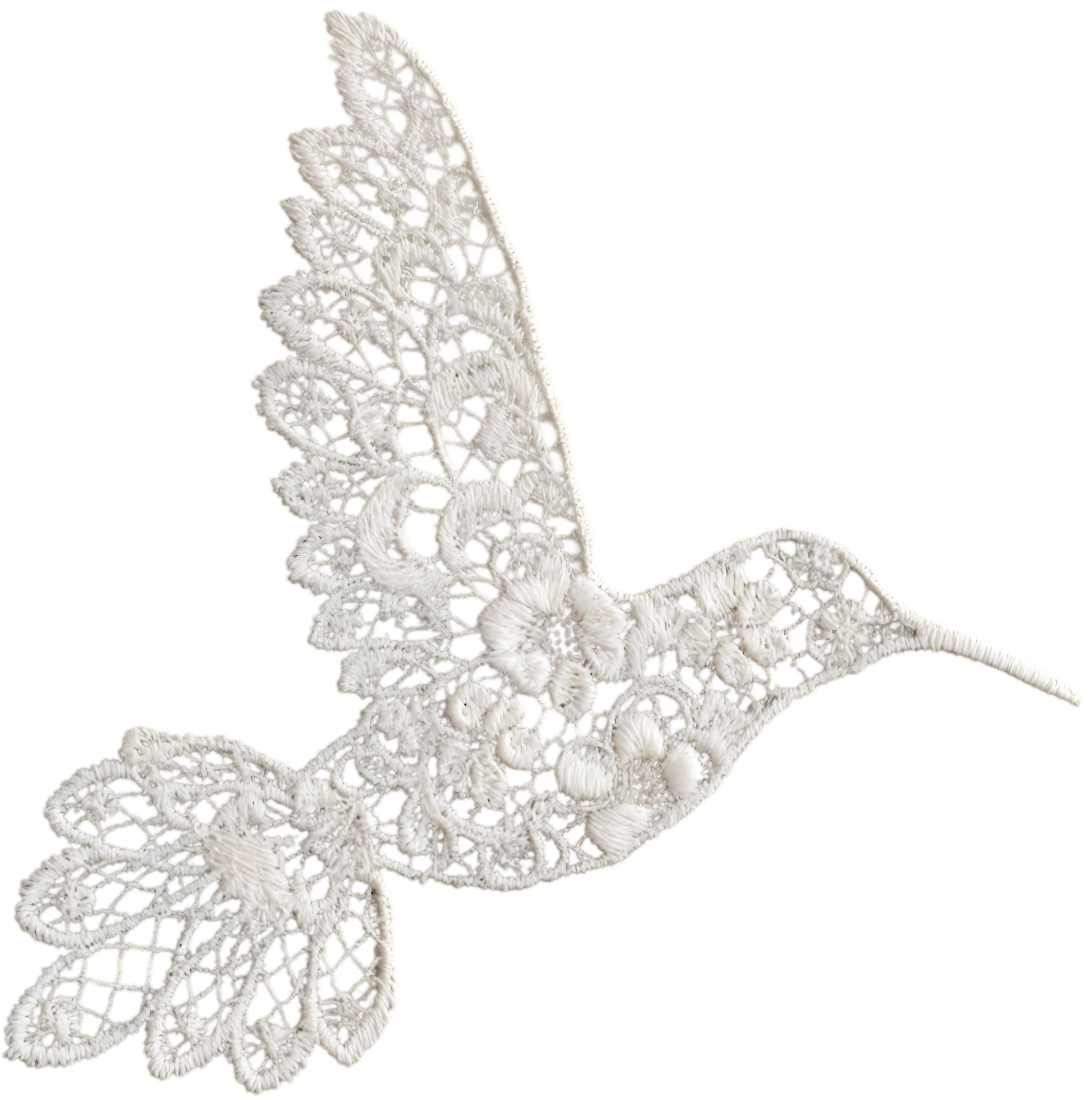 A white, lace hummingbird decorative piece with intricate cutouts.