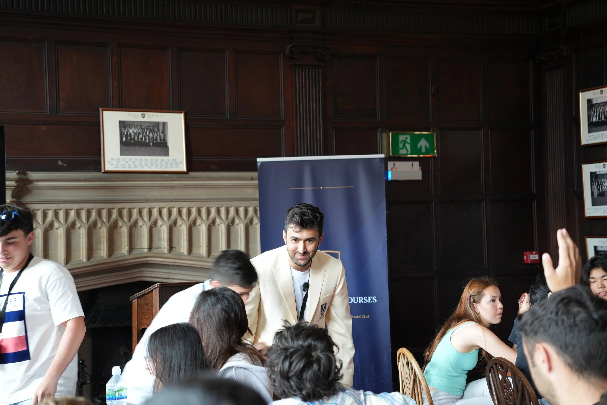 Khushal presenting on communication to a room of students