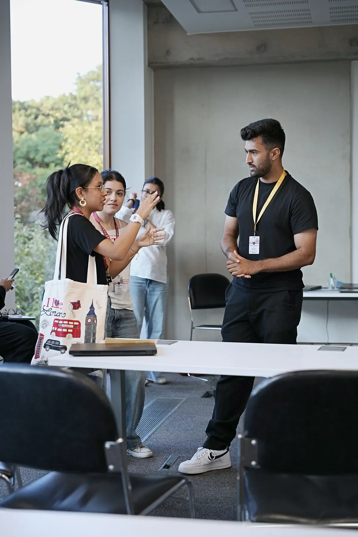 Khushal in conversation with students after a session
