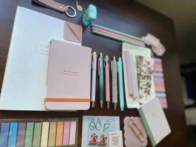 Created for a single mom of 3 boys; she wanted pink - but not just pink - needed to keep in a budget, infuse chaotic humor, and wanted quality pens, journals, and notes.