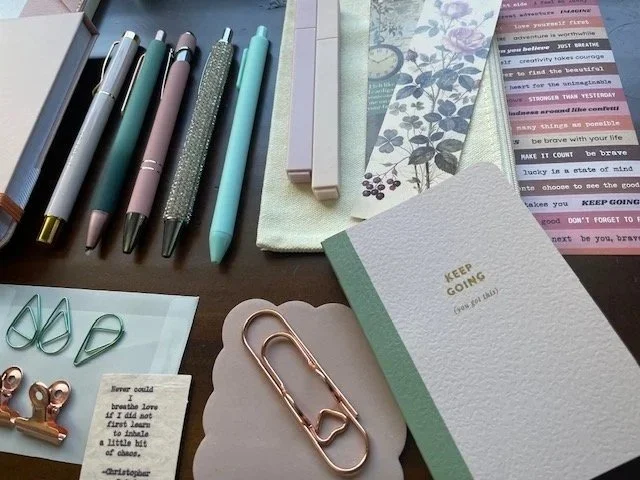 She can use the note pad for her lists, the larger journal for her own thoughts, and the pocket journal for her handbag. And there's a lot of pink.