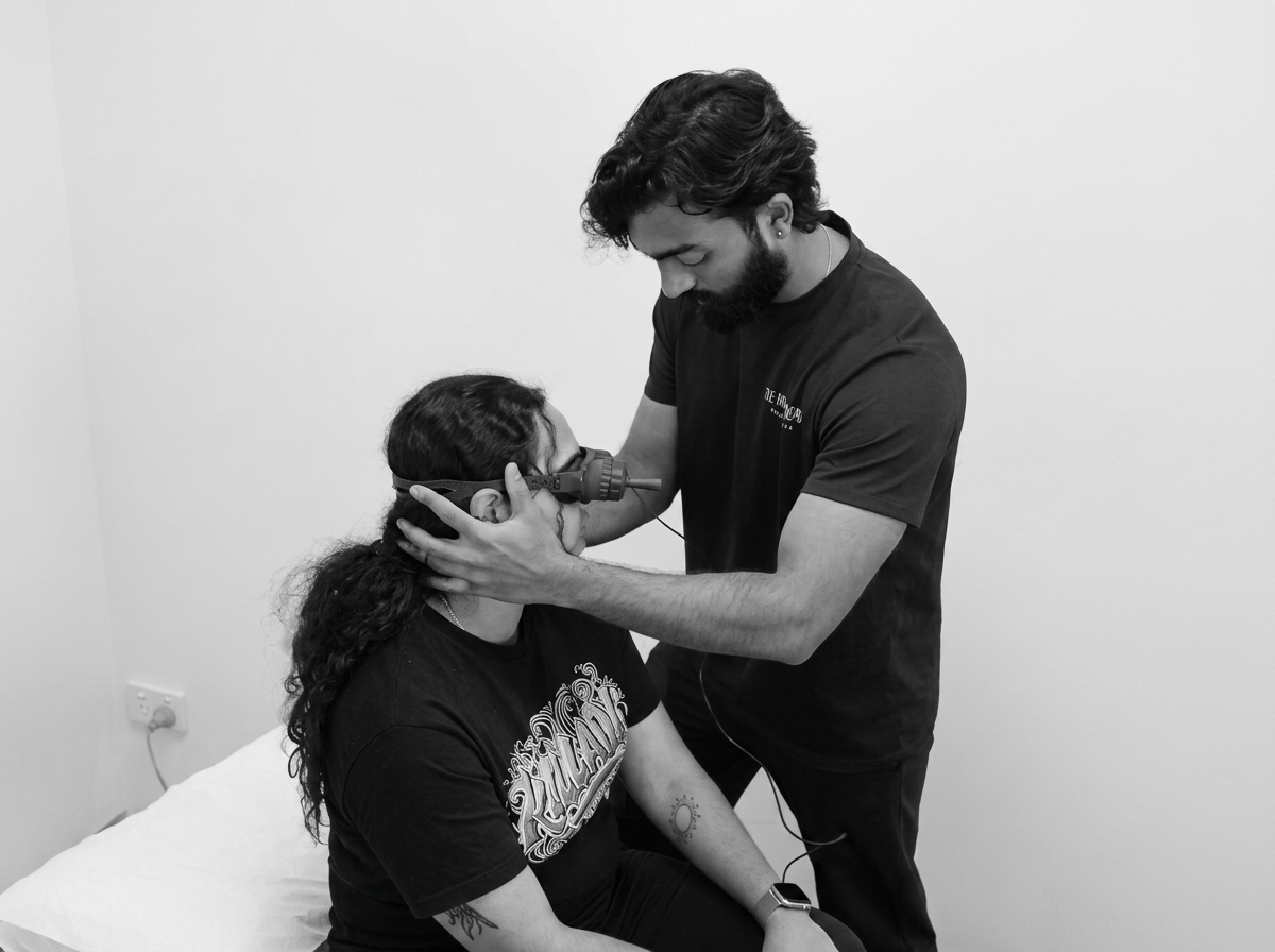 Vestibular Physiotherapist in Blacktown assessing a woman with vertigo and dizziness with vesticam goggles.