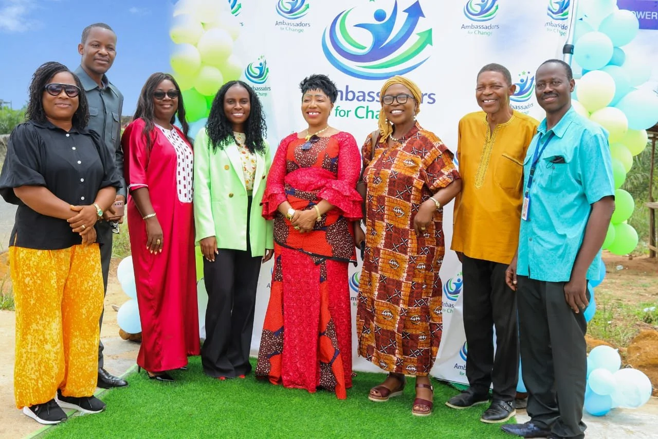 Board members a long with the Assistance Minister of Gender with the logo of 'Ambassadors for Change'.