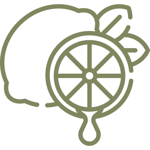 An icon of a lemon with a slice cut out, showing a droplet of fresh juice falling from it.