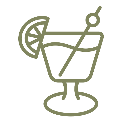 An icon of a cocktail glass with a lemon garnish and a stir stick.