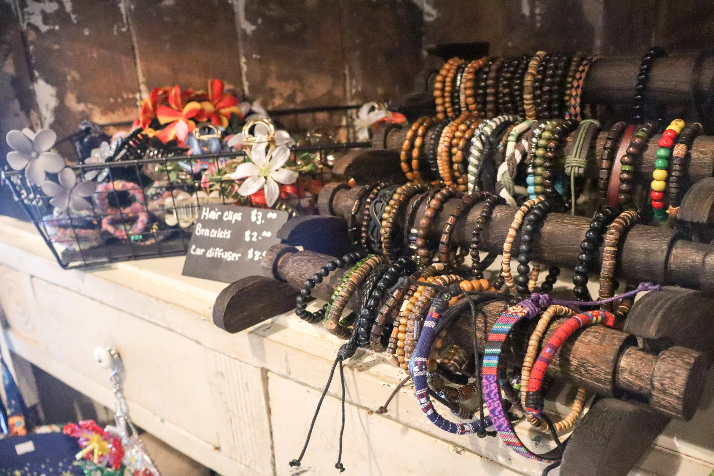 shelves displaying local jewelry products