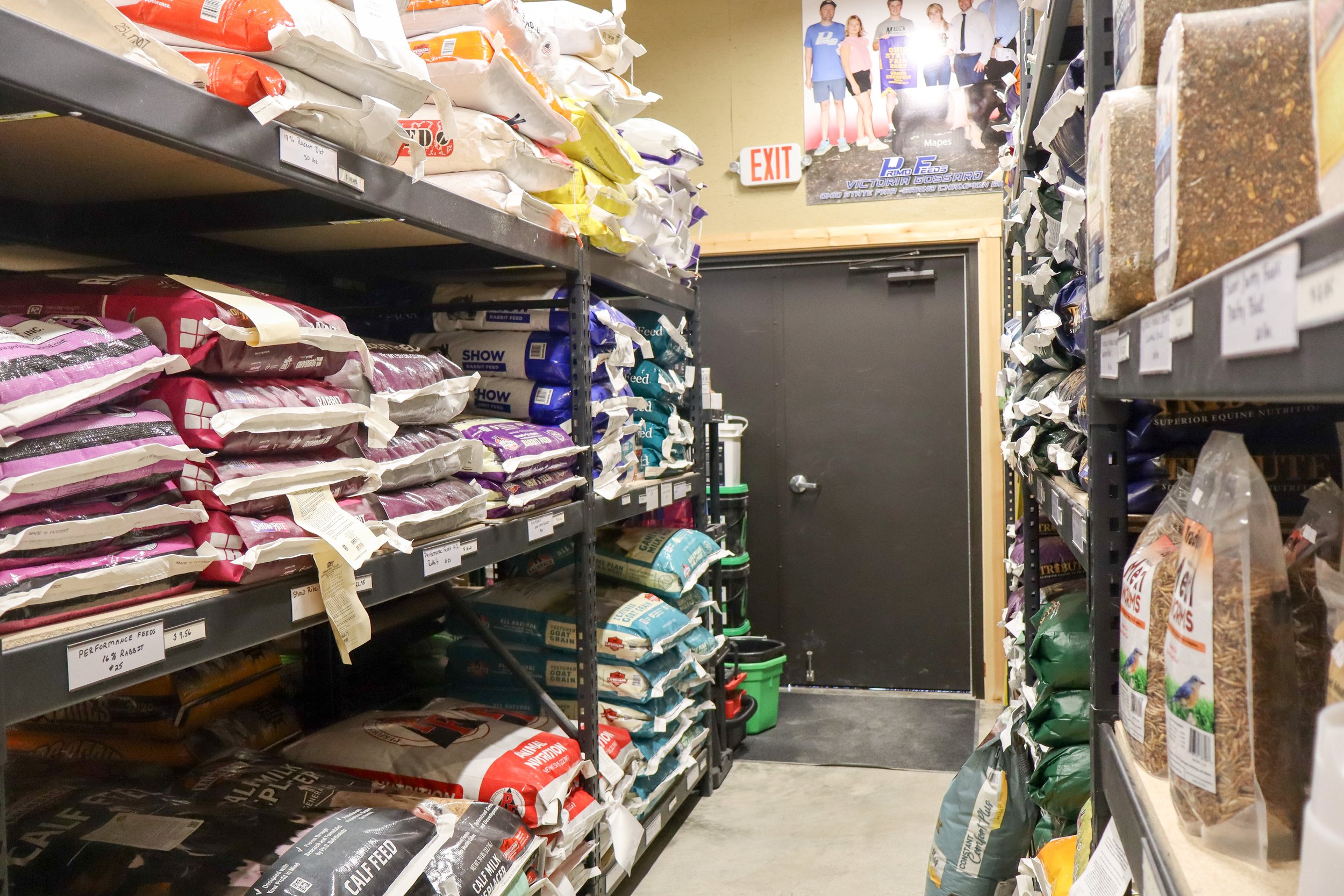 shelves full of animal food and supplements