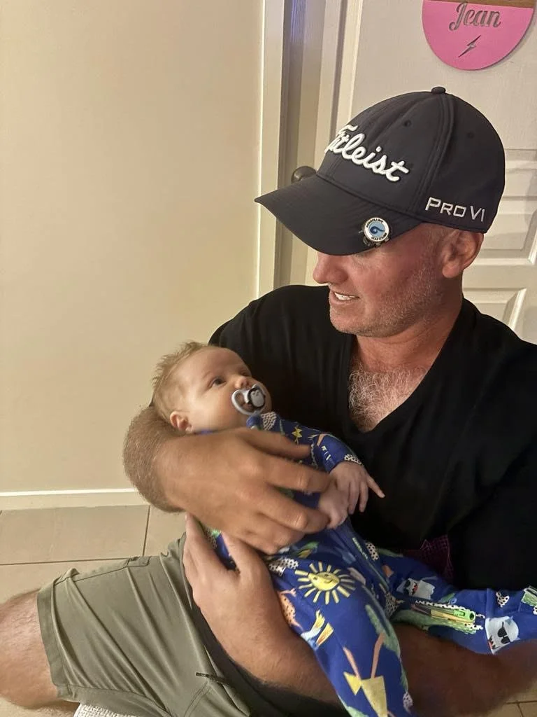 Jason and Rocky (Join page): Jason Rigby holding his nephew