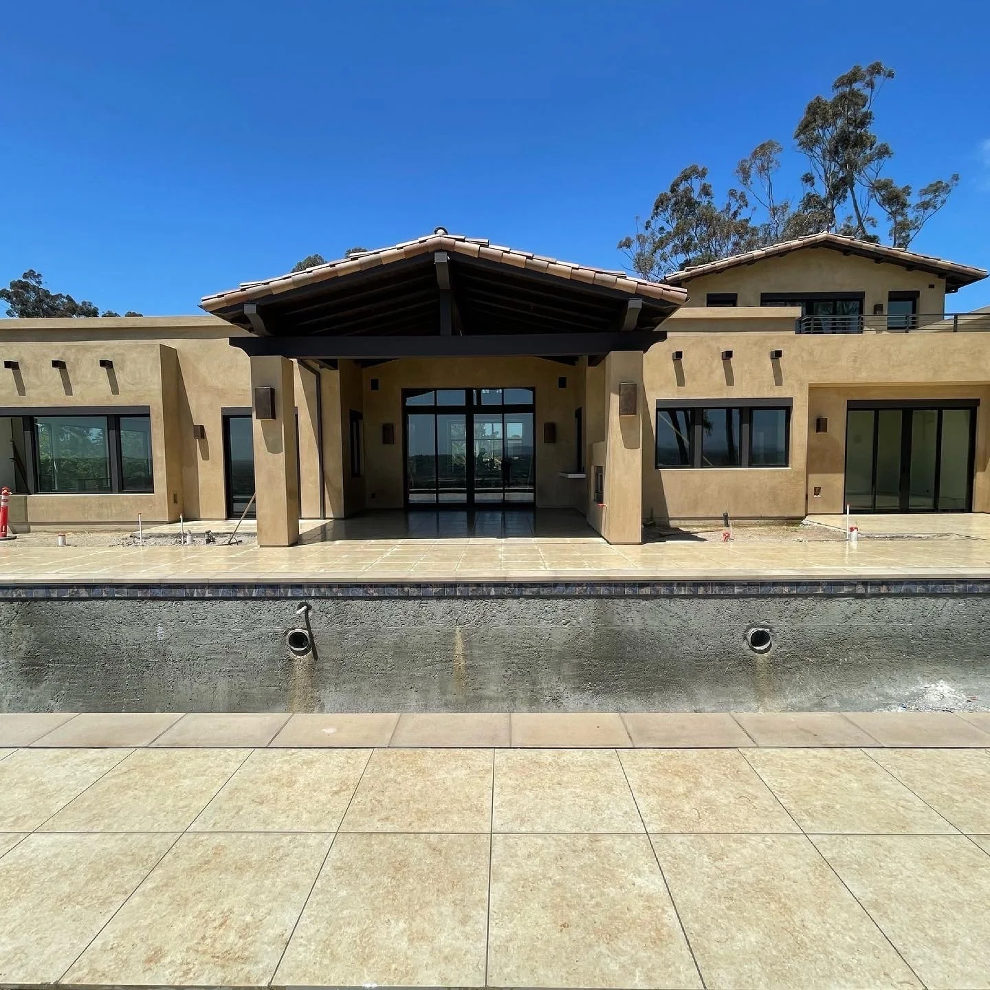 Custom porcelain paver installation delivering a clean, modern finish with long-lasting durability and a high-end outdoor look