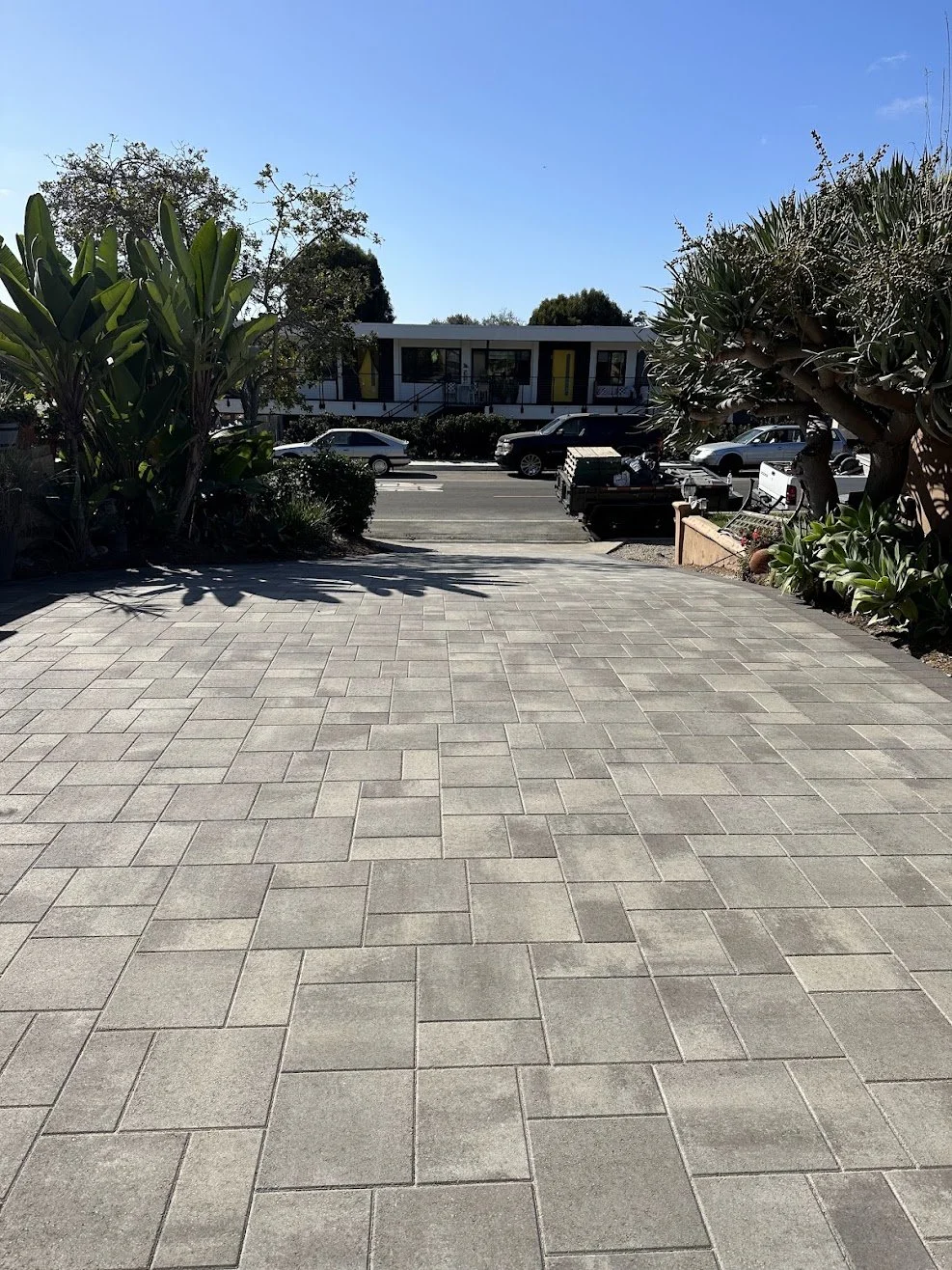 Paver driveway renovation designed for a clean modern look, lasting durability, and improved curb appeal. (Catalina Grana Rio)