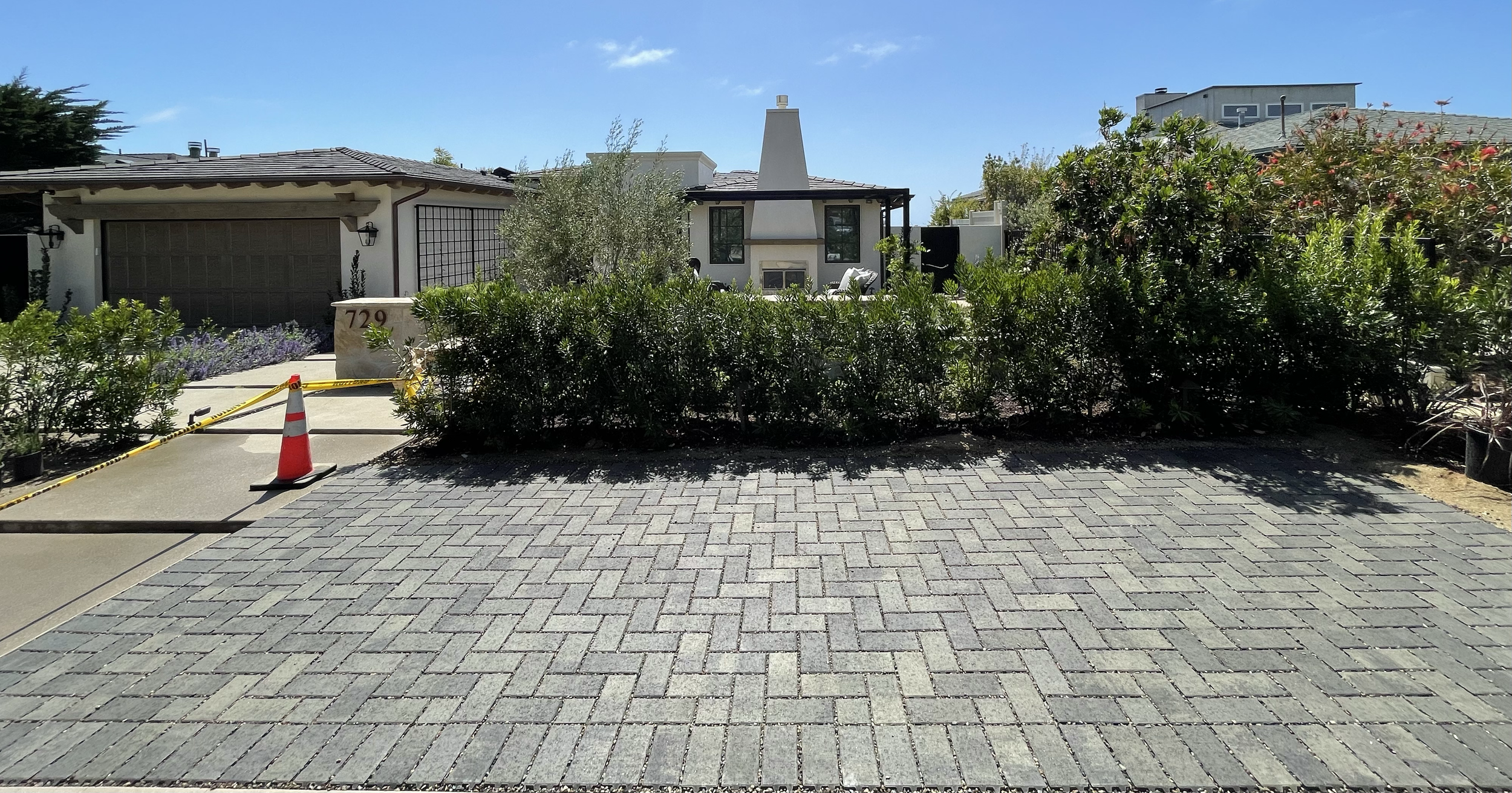 Aqua-line preamble paver installation designed for coastal communities, providing effective drainage while maintaining a clean, durable finish.