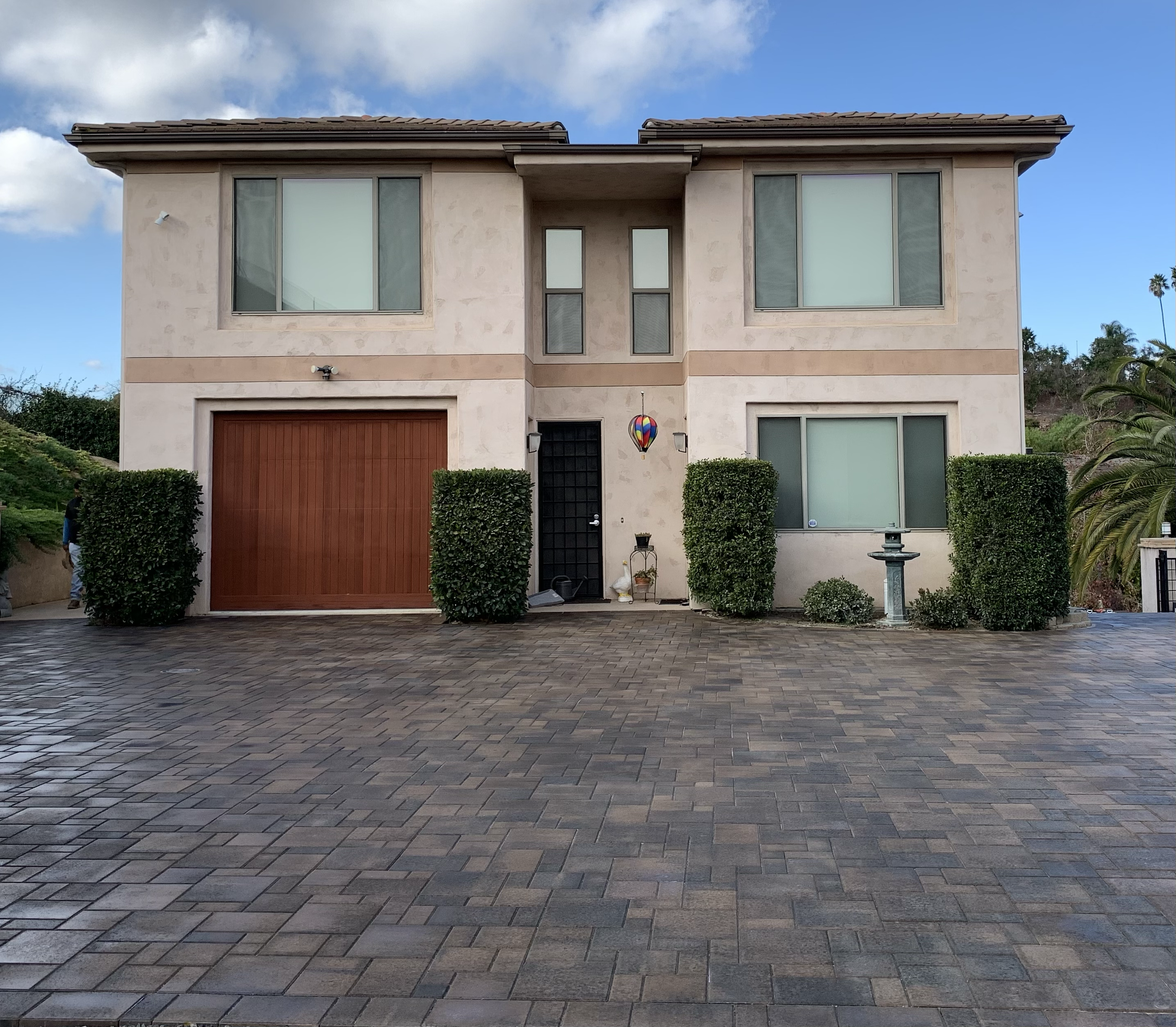 Custom paver driveway installation designed to enhance curb appeal, improve functionality, and provide long- lasting durability. (Orco Villa Borrego)