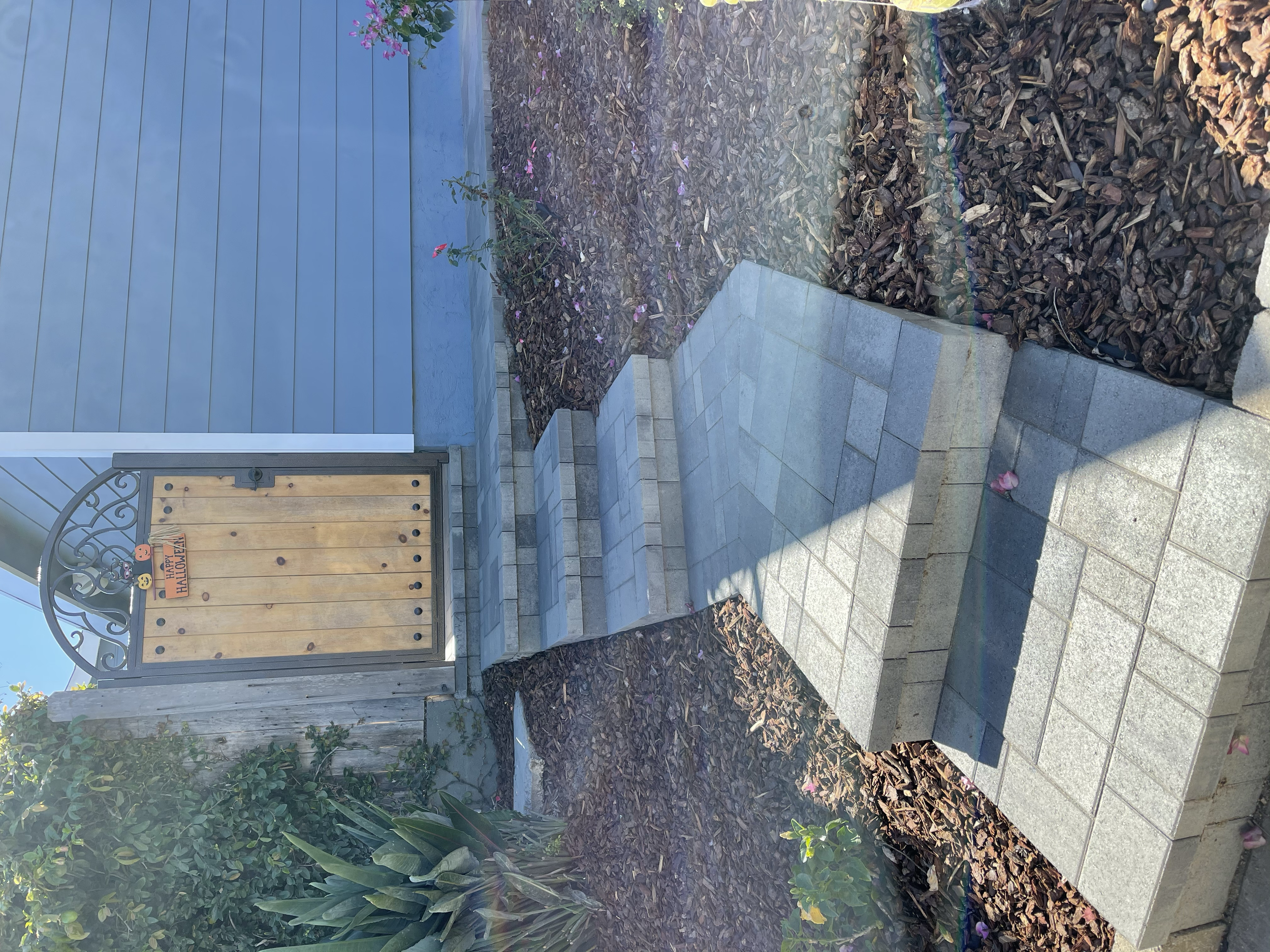 Custom paver steps and walkway installation creating safe, durable access while complementing the surrounding landscape. 