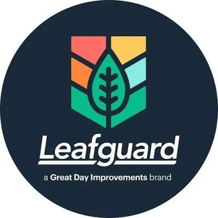 Logo of Leafguard, a Great Day Improvements brand, featuring a colorful leaf design within a shield shape on a dark background.