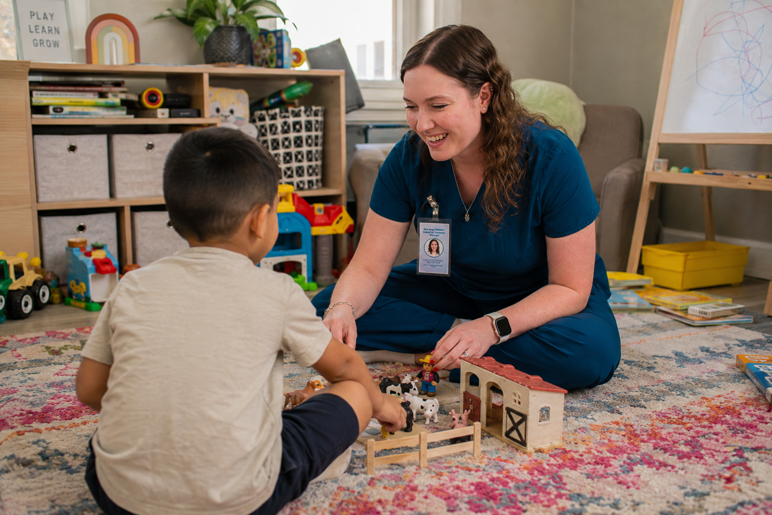 Speech therapist and a young child participating in play-based in-home speech therapy