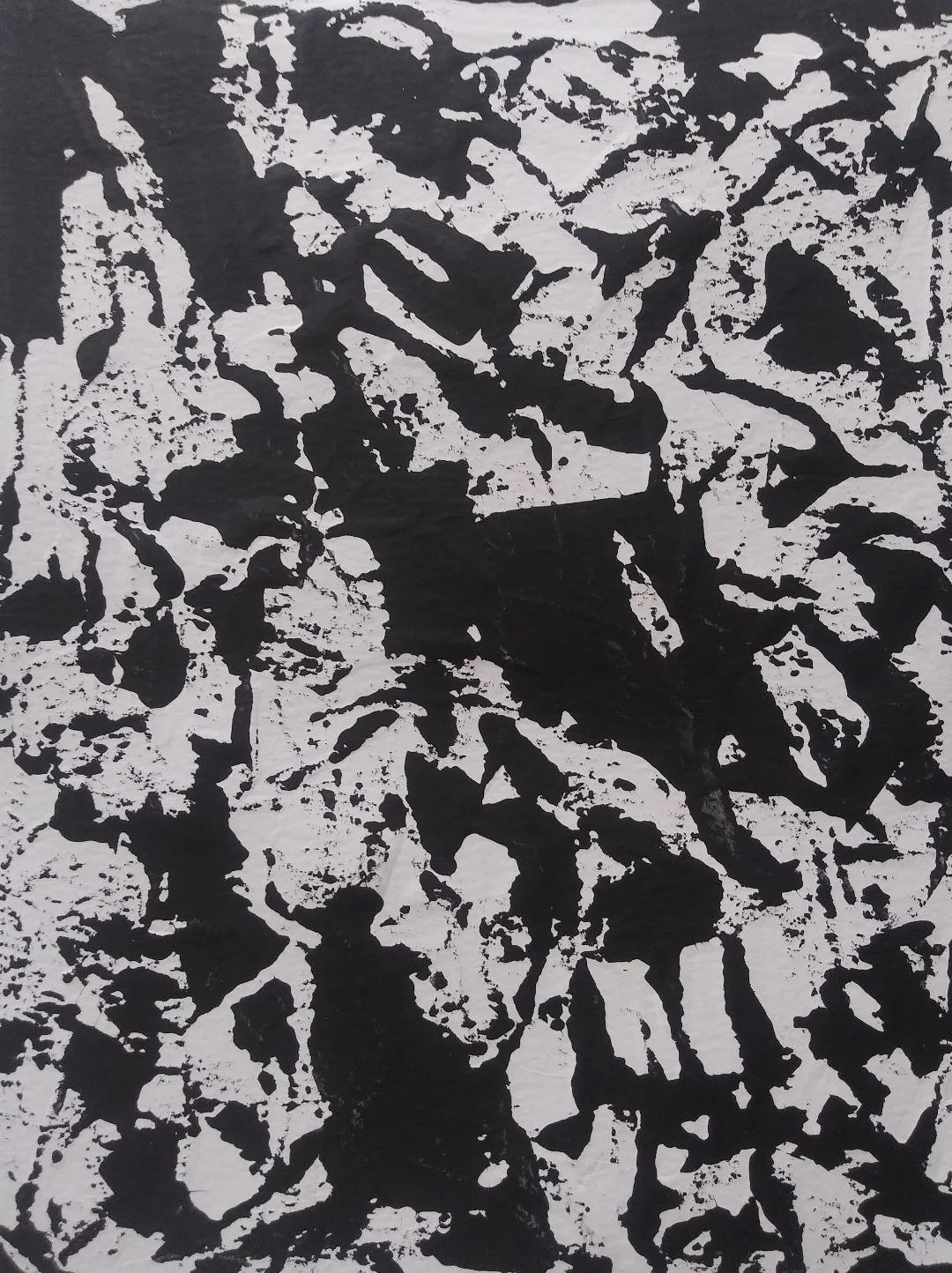 Abstract black and white splattered paint pattern