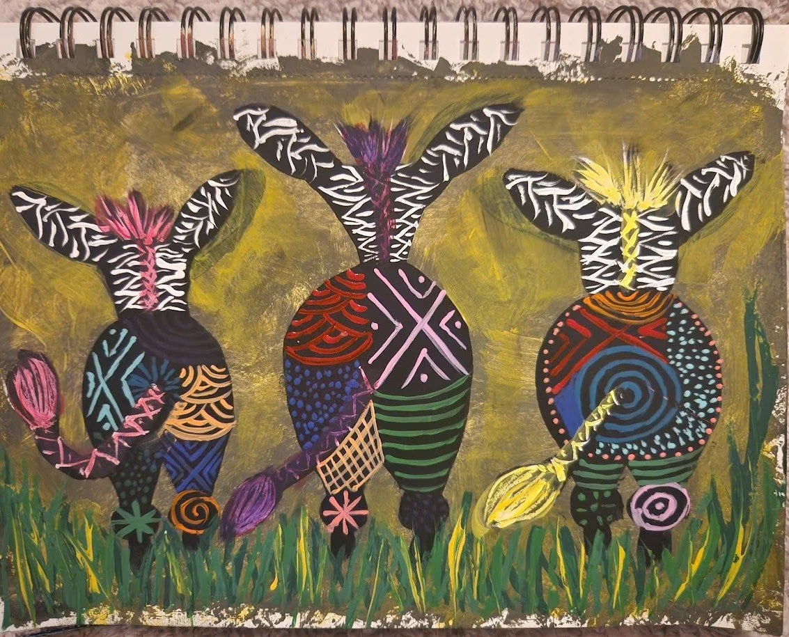 Colorful painting of three abstract, stylized carrots with black and white patterned tops, set against a yellow-green background with grass at the bottom.