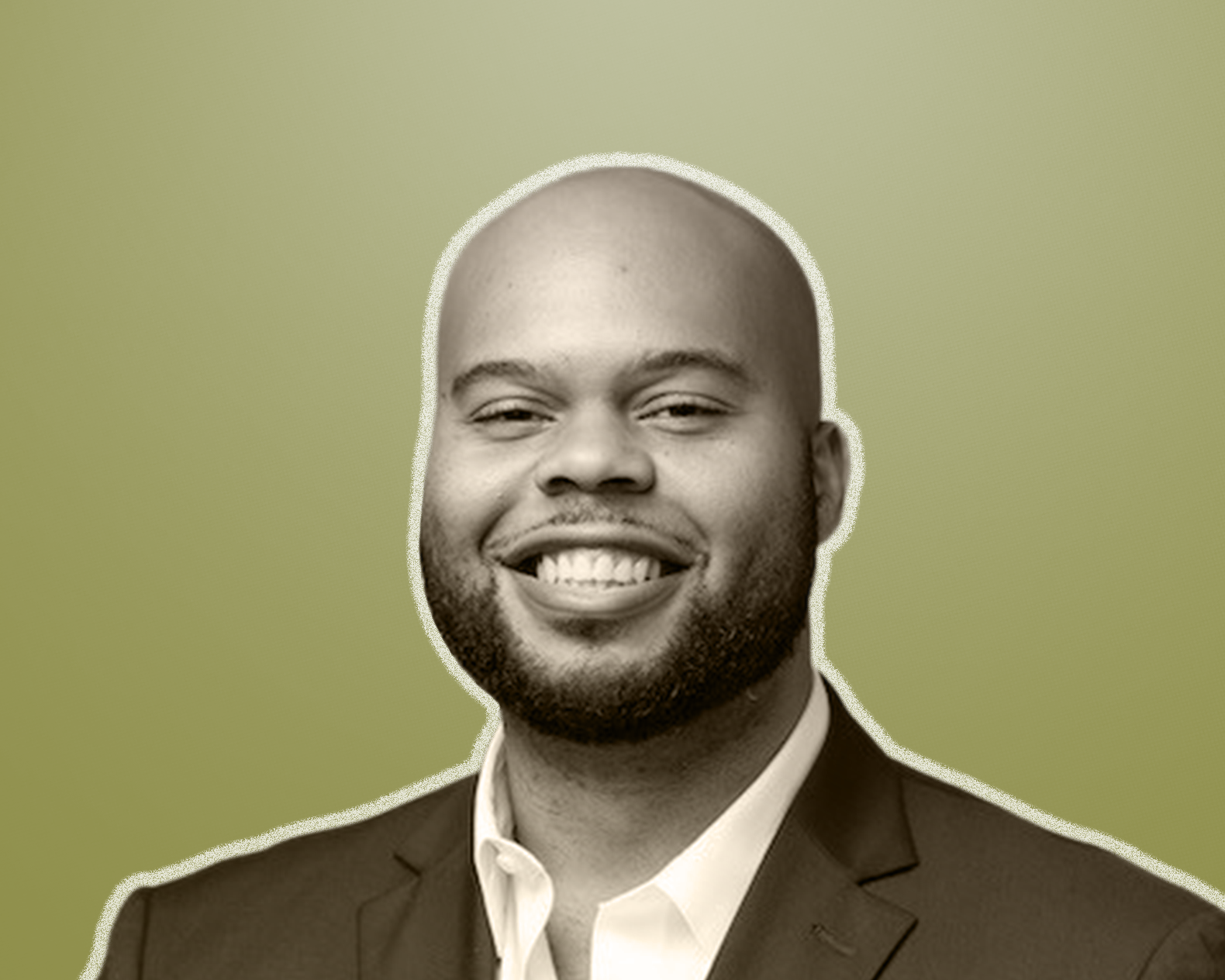 A smiling man with a beard, dressed in a suit and tie, against a green background.