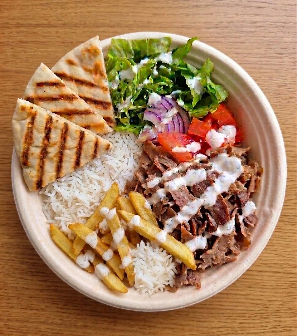 Classic Beef & Lamb Döner Bowl with rice, fries, salad, pita, and sauce