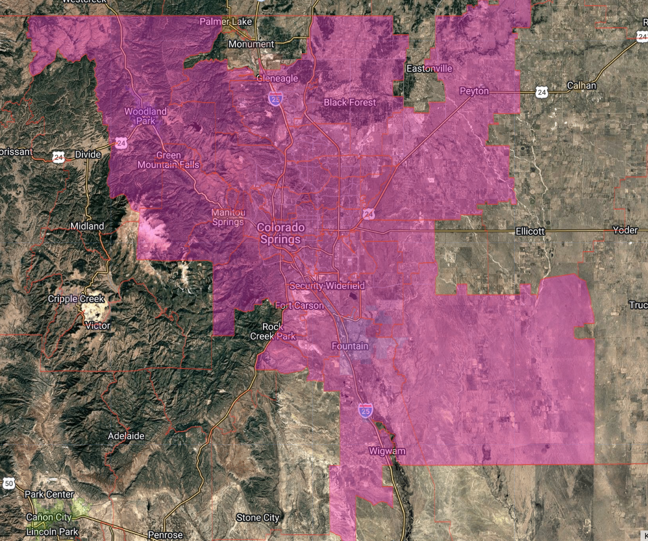 Map of Colorado Springs and surrounding areas with the city and nearby towns highlighted in pink.