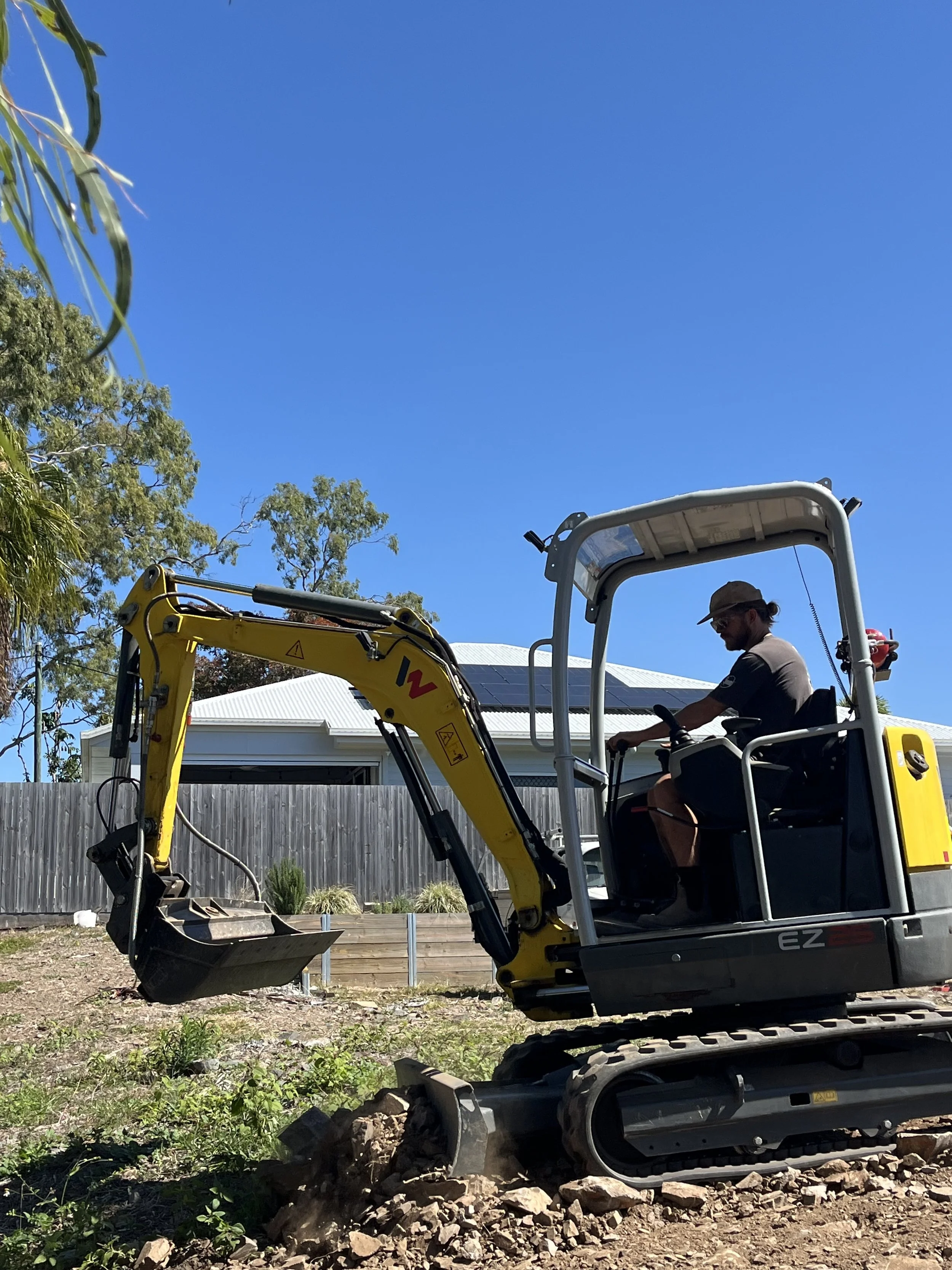 Jim completing excavation work for residential plumbing and drainage.