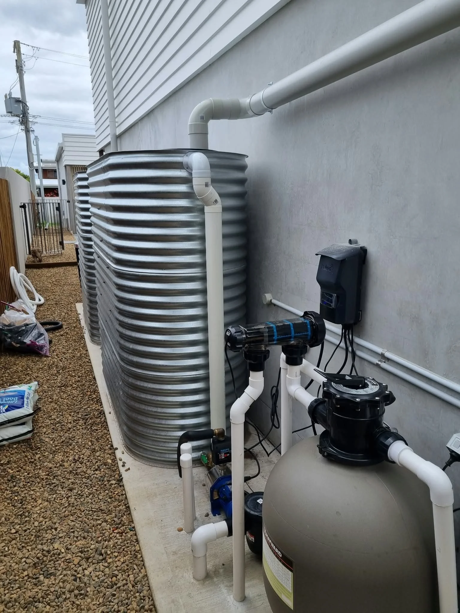 Rainwater tank and water filtration system installed by Crums Plumbs.