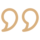 Two gold-colored quotation marks on a black background.