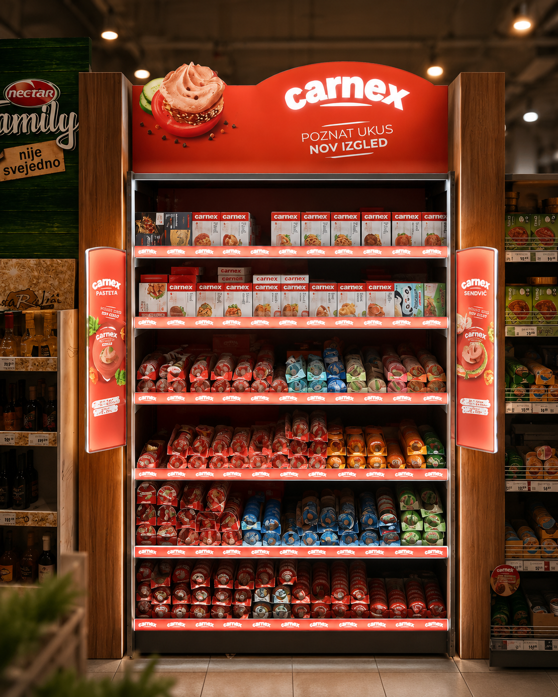 A grocery store refrigerated display with various flavors of Carnex processed cheese products in colorful packaging.