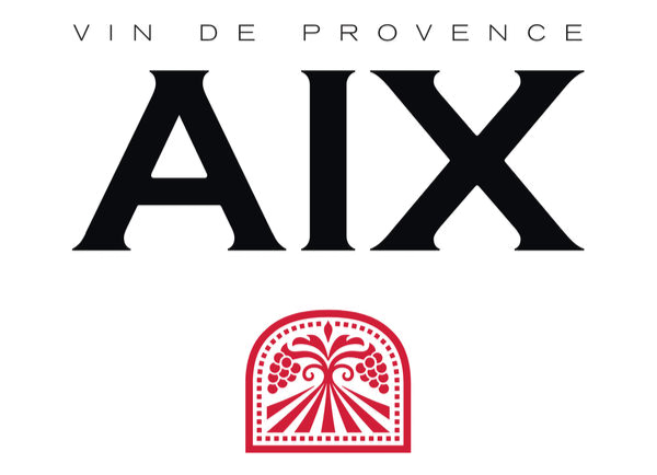 Wine label with the text "Vin de Provence" and large letters "AIX" and a red decorative emblem below.