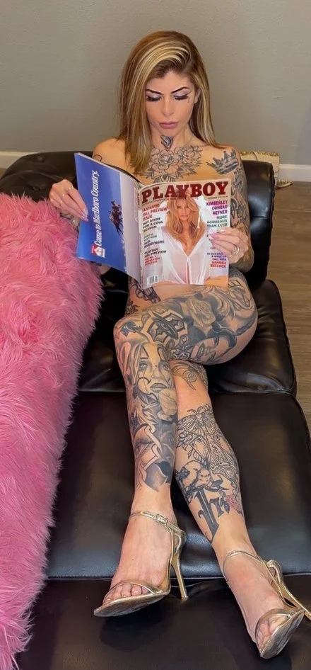 Lala naked reading a playboy