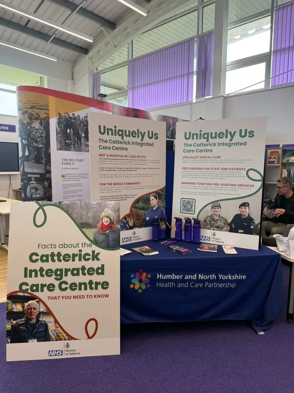 The stall at a public engagement event for the Catterick Integrated Care Centre, featuring A0 foam boards designed by Melissa Cooper