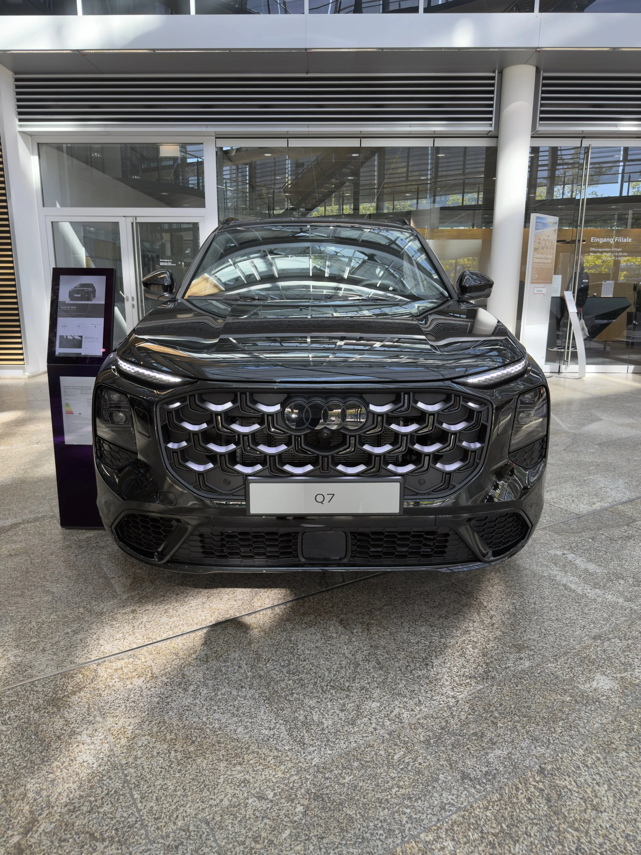 Front view of a black Audi Q7 displayed at Audi in Ingolstadt.