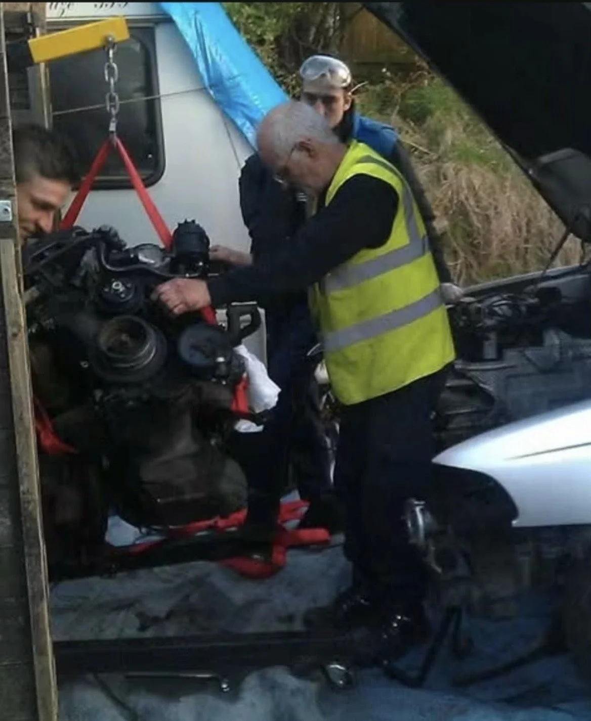 Clip point hires dad helping with an engine change