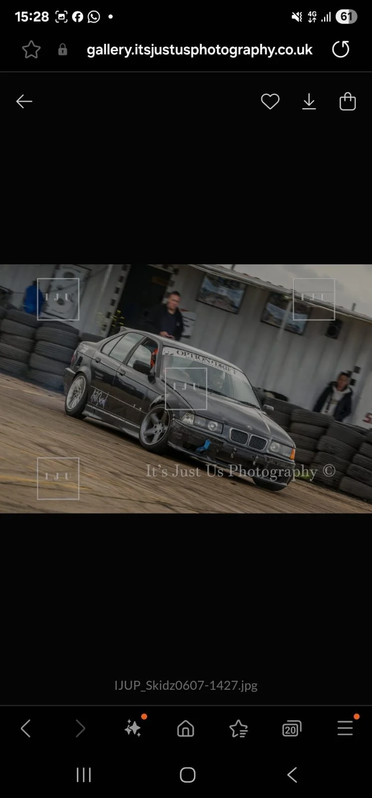 A black drift car sending it on a drift day