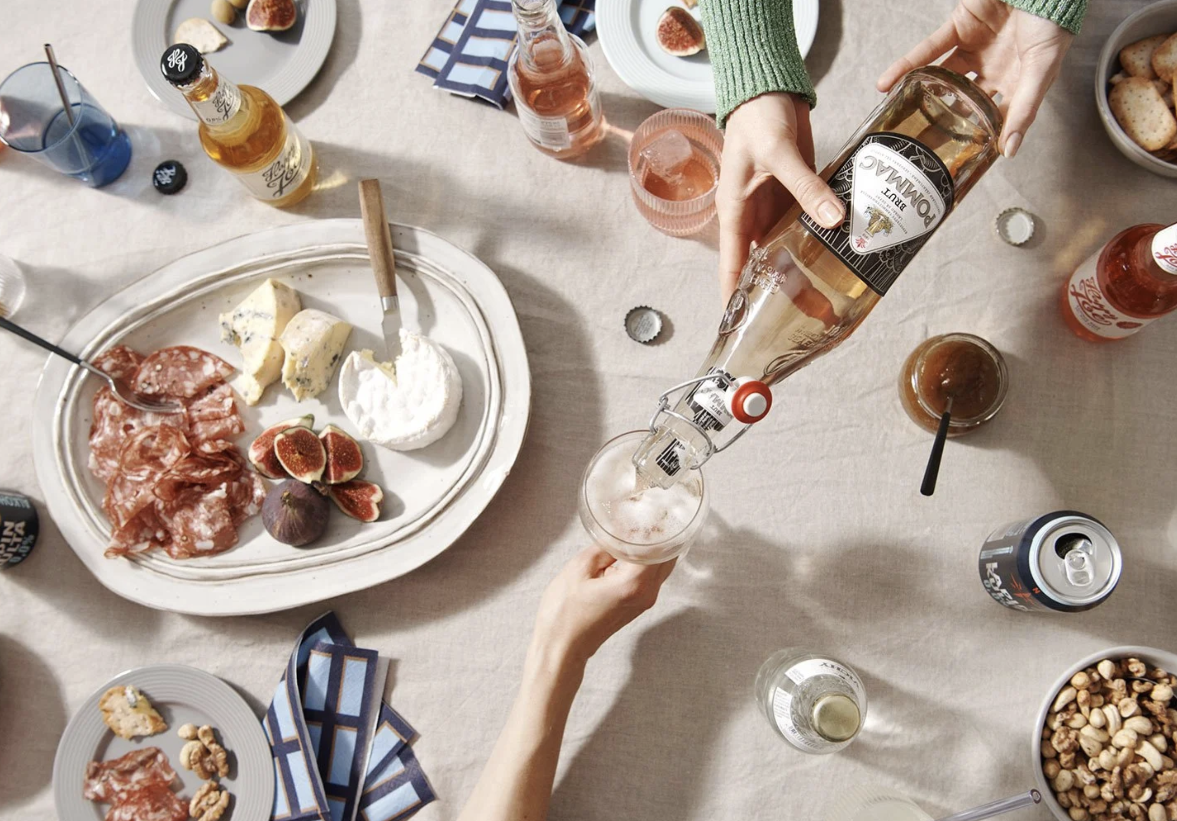 table setting with charcuteri and pommac. brand photography