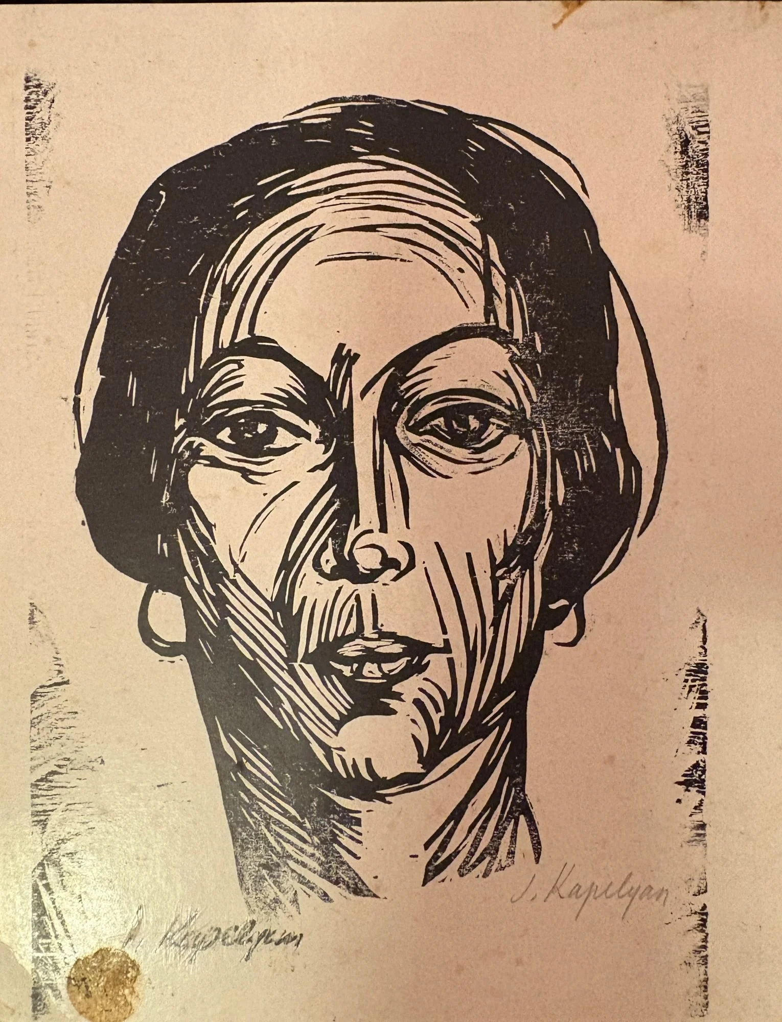 Joseph Kapelyan original woodcut graphic print of a woman's face.