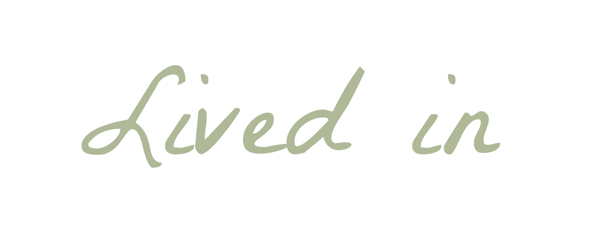 Text in a pastel green cursive font that reads "Lived in" on a white background.