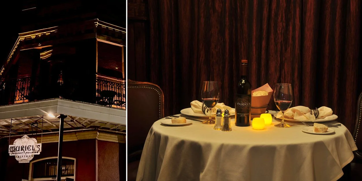 Muriel's Jackson Square exterior at night beside a candlelit table set with wine and bread