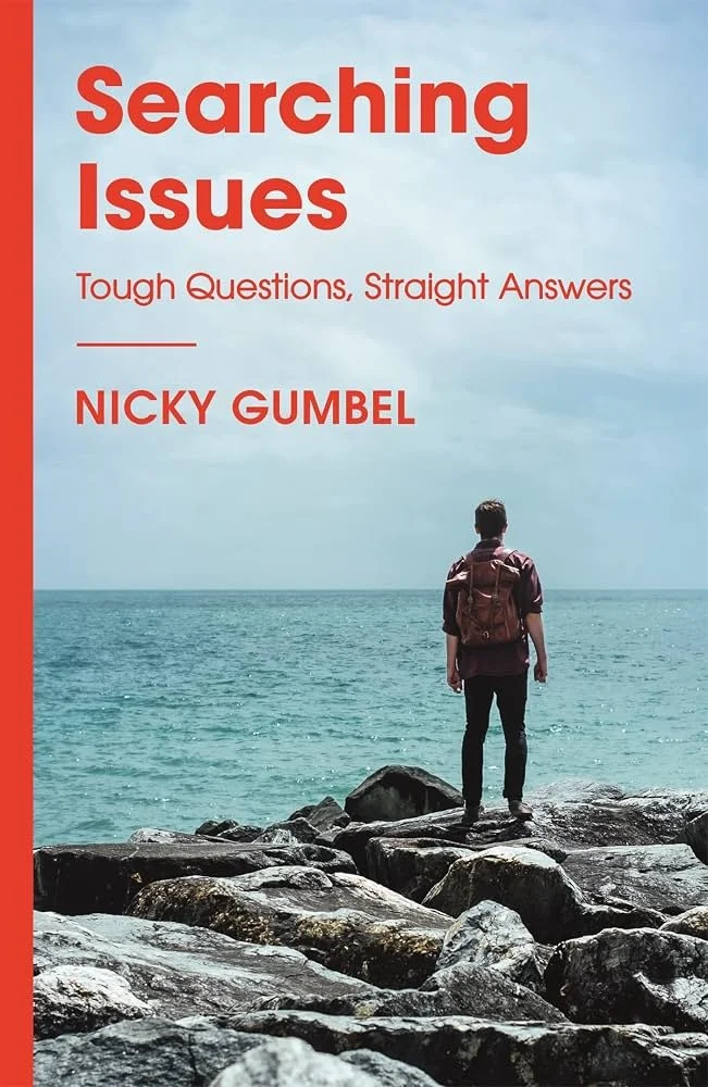 Book cover titled 'Searching Issues: Tough Questions, Straight Answers' by Nicky Gumbel. The cover features a person with a backpack standing on rocks by the ocean, looking out at the water and sky.